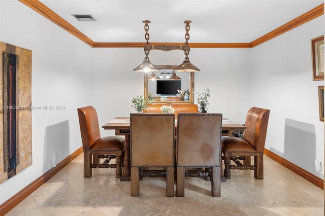 dining area with crown molding