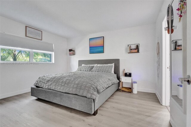 bedroom with light wood-type flooring