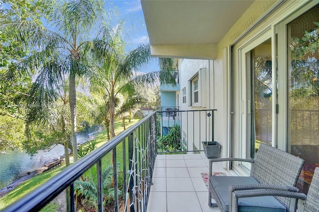balcony featuring a water view