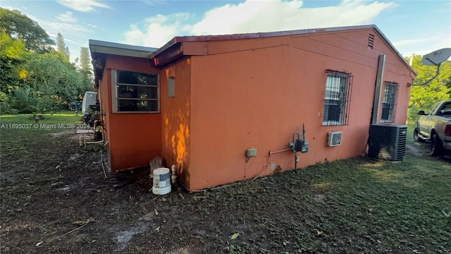 view of home's exterior featuring central air condition unit