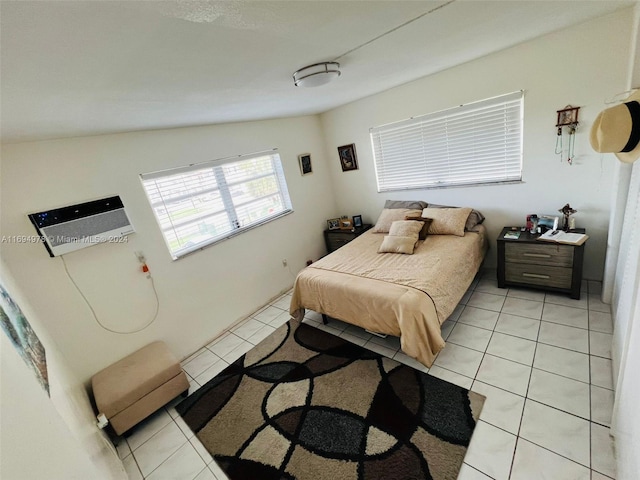 tiled bedroom featuring lofted ceiling