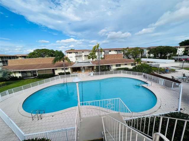 view of pool featuring a patio area