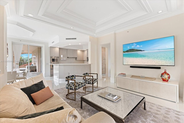 living room with ornamental molding and light tile patterned floors