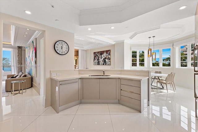 kitchen with crown molding, sink, light tile patterned flooring, and an inviting chandelier