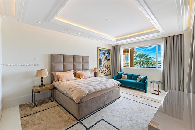 bedroom with a tray ceiling