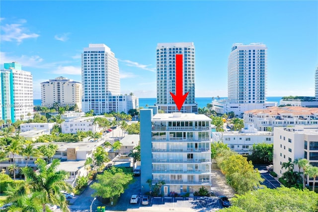 birds eye view of property with a view of city