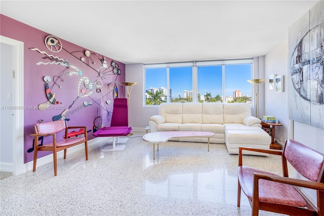 524 Orton Ave Unit 603, Fort Lauderdale, FL 33304 - living area with baseboards and speckled floor