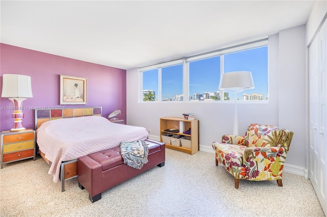 524 Orton Ave Unit 603, Fort Lauderdale, FL 33304 - bedroom featuring baseboards and a closet
