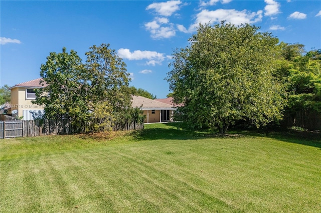 view of yard with fence