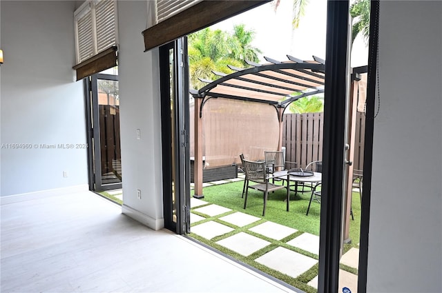 doorway to outside featuring hardwood / wood-style floors