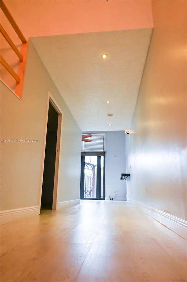 unfurnished room featuring wood-type flooring