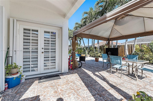 view of patio / terrace with a gazebo and french doors