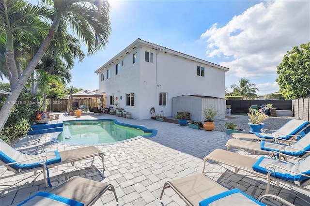 view of swimming pool featuring a patio