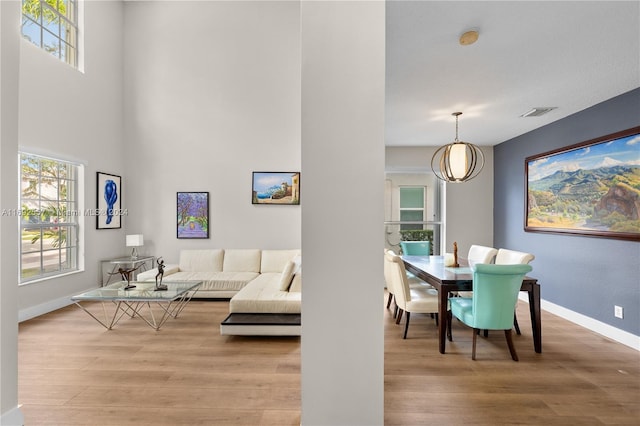 dining area with light hardwood / wood-style floors