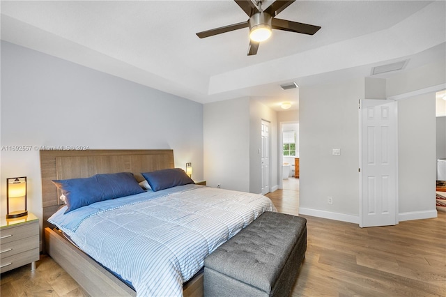 bedroom featuring ceiling fan and wood-type flooring