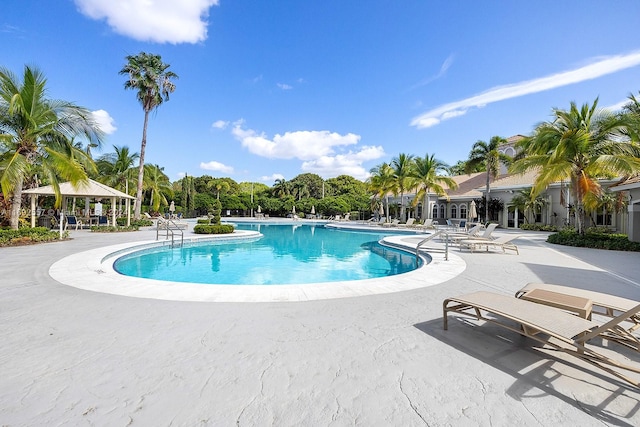 view of pool featuring a gazebo and a patio area