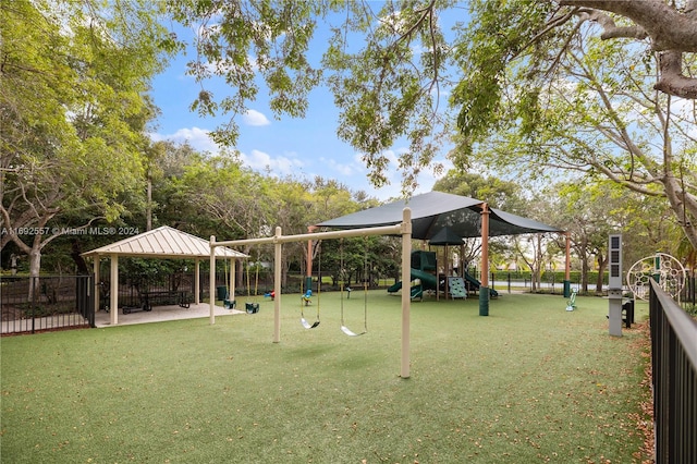 view of home's community featuring a playground, a lawn, and a gazebo