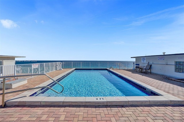 community pool featuring a patio