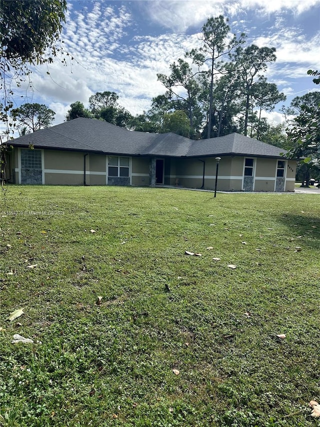 exterior space featuring a front yard