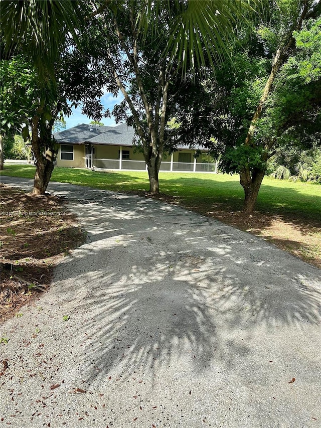 exterior space with a front lawn