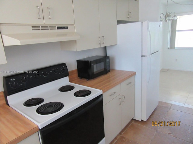 kitchen featuring a chandelier, white cabinets, exhaust hood, and white appliances