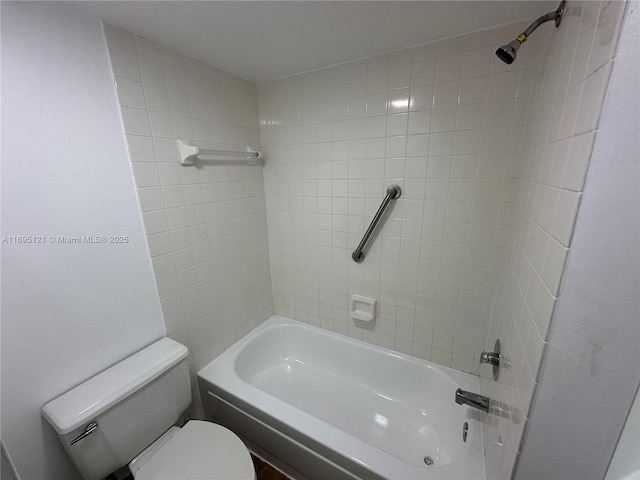 bathroom with shower / bath combination and toilet