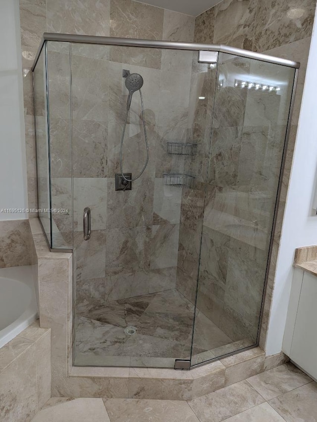 bathroom featuring plus walk in shower