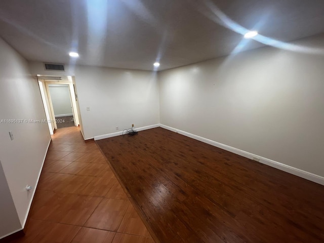 interior space with dark hardwood / wood-style flooring