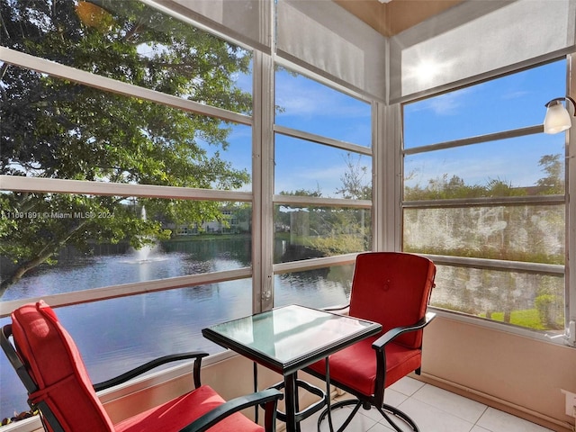 sunroom with a water view