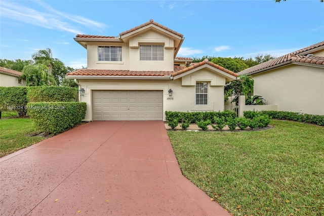 mediterranean / spanish-style home with a garage and a front lawn