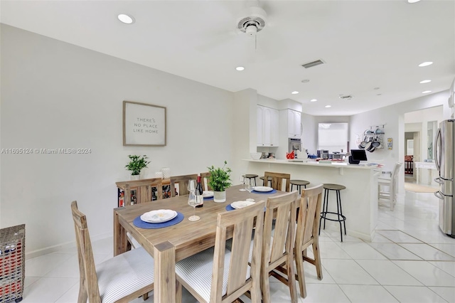 view of tiled dining space