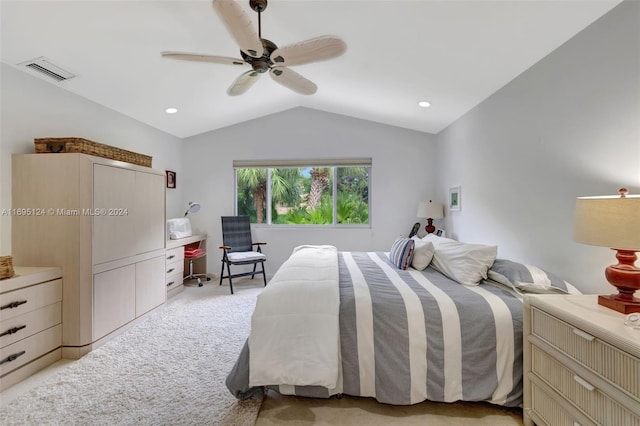 carpeted bedroom with ceiling fan and lofted ceiling