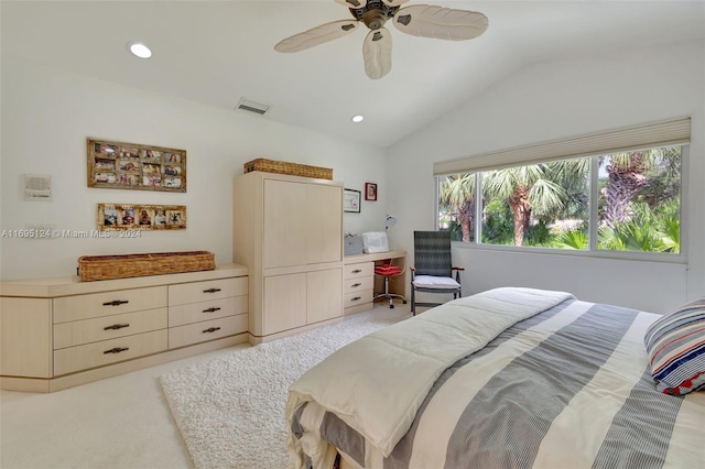 carpeted bedroom featuring ceiling fan and lofted ceiling