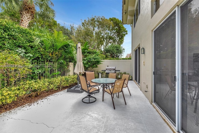 view of patio / terrace featuring a grill