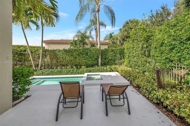 view of patio / terrace featuring a fenced in pool