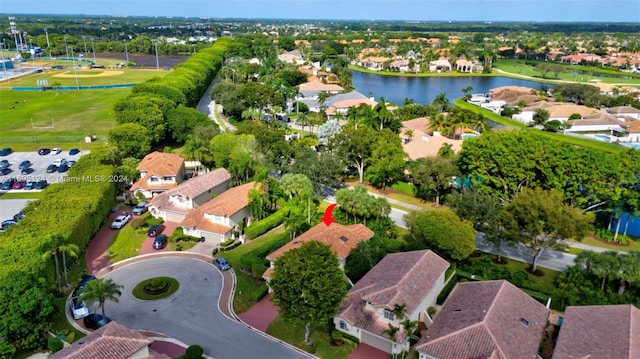 drone / aerial view with a water view