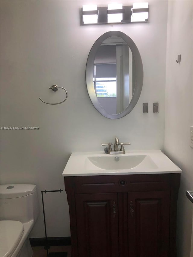 1420 Brickell Bay Dr Unit 1506D, Miami, FL 33131 - half bath featuring vanity and toilet