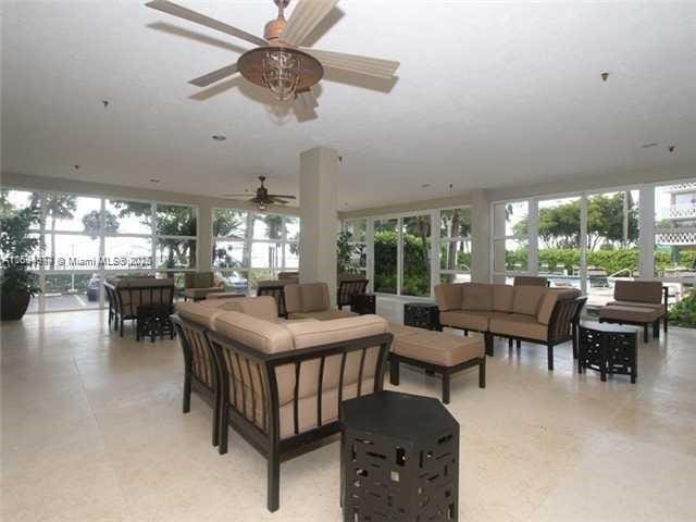 living room featuring ceiling fan