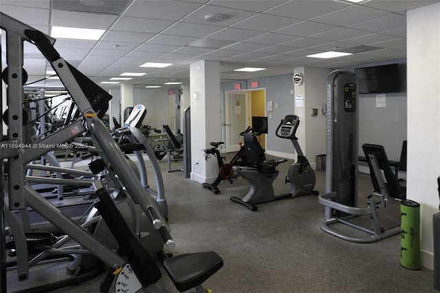 workout area with a drop ceiling