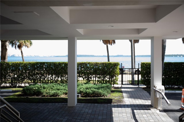 view of patio / terrace featuring a water view