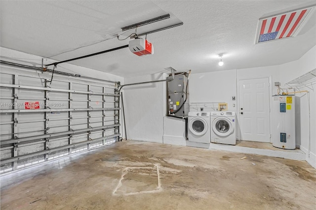 garage featuring heating unit, water heater, washer and dryer, and a garage door opener