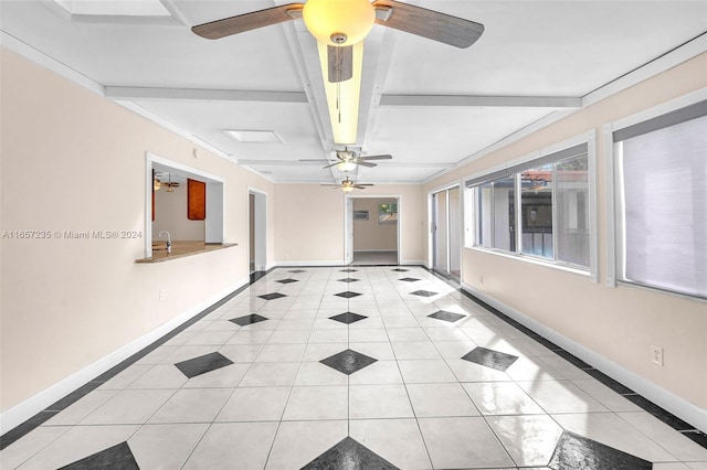 hall featuring beamed ceiling and light tile patterned flooring