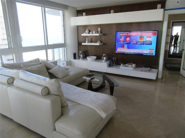 living room featuring plenty of natural light