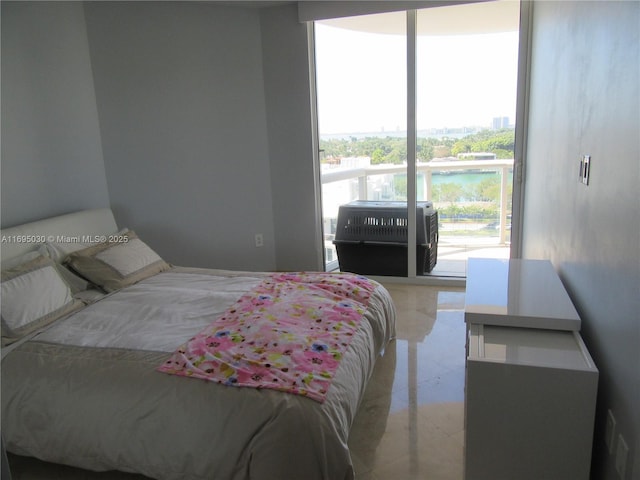 bedroom featuring light tile patterned flooring