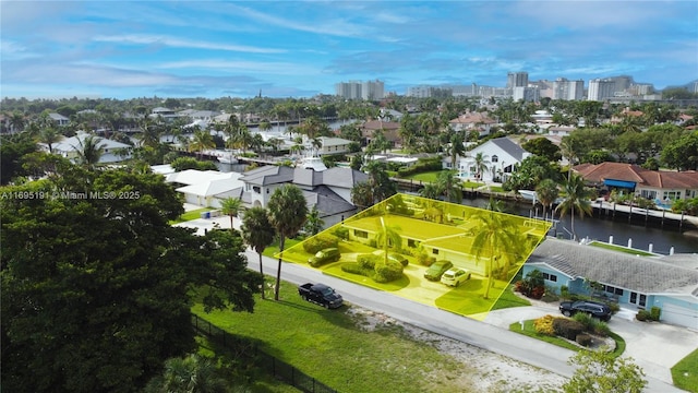 drone / aerial view featuring a water view