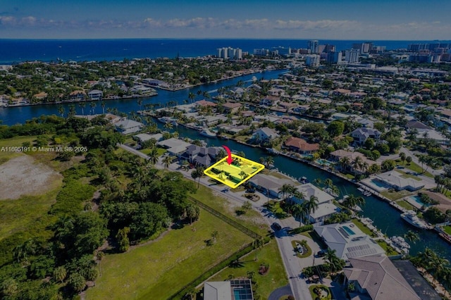 drone / aerial view with a water view