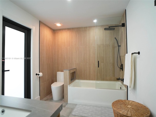 bathroom featuring shower / bath combination and toilet