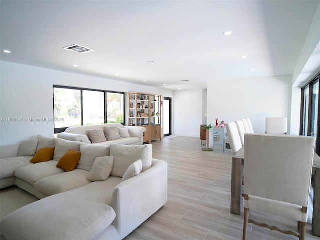 living room featuring light wood-type flooring