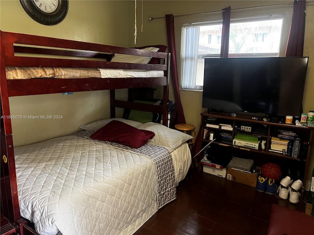 bedroom featuring hardwood / wood-style flooring