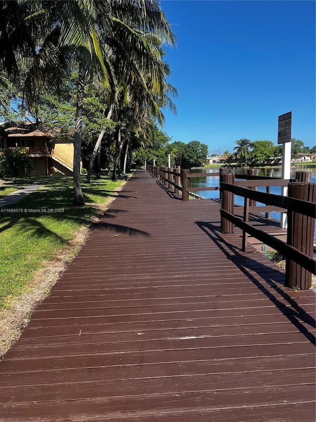 dock area with a water view